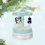 Playful Penguins on Carousel Musical Ornament With Light and Motion